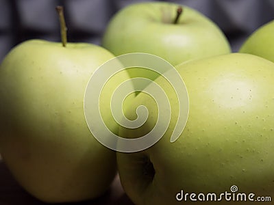 Green apples of the Reinette Simirenko variety, close-up Stock Photo