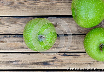 green apples on rustic wooden plank background Stock Photo