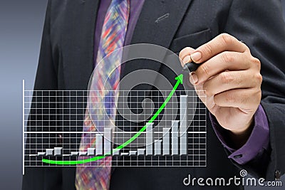 Green arrow on success graph Stock Photo