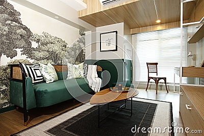 Green Asian sofa with throw pillows and cloth draped over, with wall art of trees at the back Stock Photo