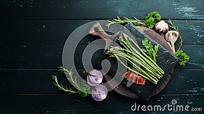 Green asparagus with vegetables. Dishes menu. Free copy space. Stock Photo