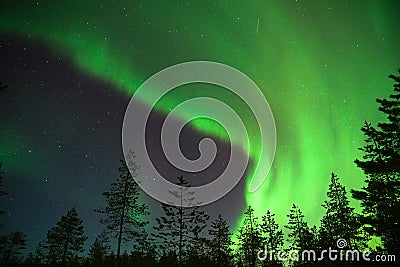 Green aurora borealis in lapland, Finland Stock Photo
