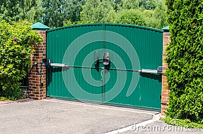 Automatic electric gates in a private house Stock Photo