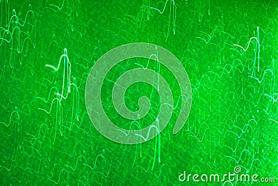 Green background with small light trails. Stock Photo
