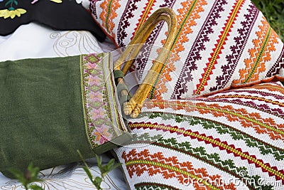 Green bag and cushions with the Slavic ornaments Stock Photo