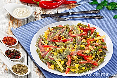 Green beans, corn, ham and cheese salad Stock Photo