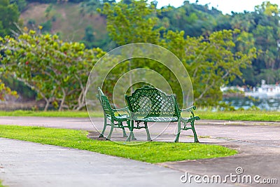 Green benches in the Park Stock Photo