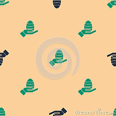 Green and black Human hand and easter egg icon isolated seamless pattern on beige background. Happy Easter. Vector Vector Illustration