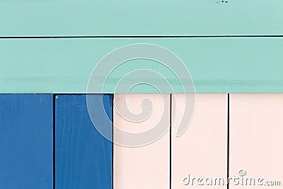 Green, blue and rose colored stained wood Stock Photo