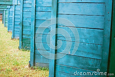 Green-blue wooden wall in the archery shooting gallery Stock Photo