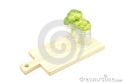 Green broccoli cabbage flowers in bottle Stock Photo