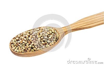 Green buckwheat in wooden spoon isolated on white background Stock Photo