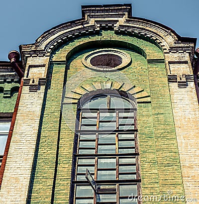 Green building with window historic building Stock Photo