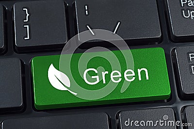 Green button keyboard with icon of leaf. Stock Photo