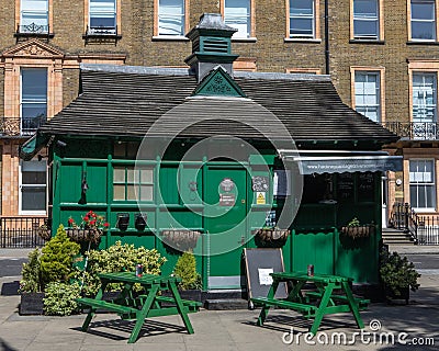 Green Cab Shelter in London, UK Editorial Stock Photo