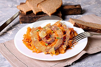 Green Cabbage Sauteed with Beef, Onions, and Herbs Stock Photo