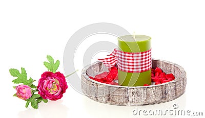 A green candle in a tray Stock Photo