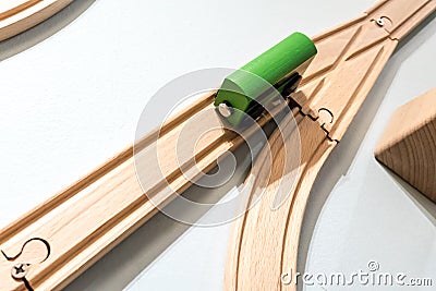 Green car toy on wooden track isolated on white Stock Photo