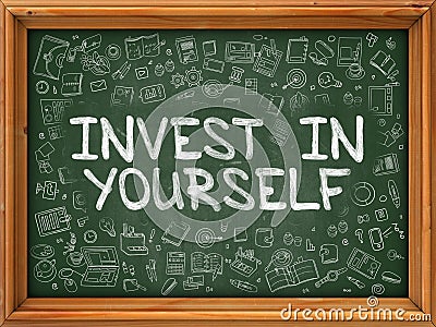 Green Chalkboard with Hand Drawn Invest in Yourself. Stock Photo