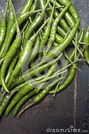 Green Chillies on Dark Background Stock Photo