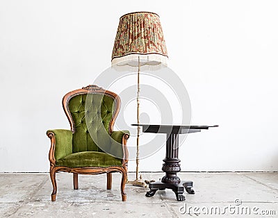 Green classical style Armchair sofa couch in vintage room with d Stock Photo