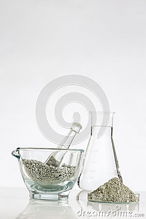 Green clay in glass mortar Stock Photo