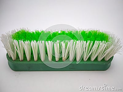 Green cleaning brush isolated with white background Stock Photo