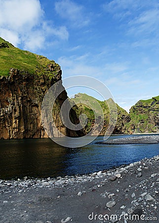 Green cliff and lake Stock Photo