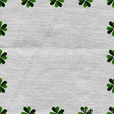 Green clover border, frame on linen fabric canvas background. Stock Photo