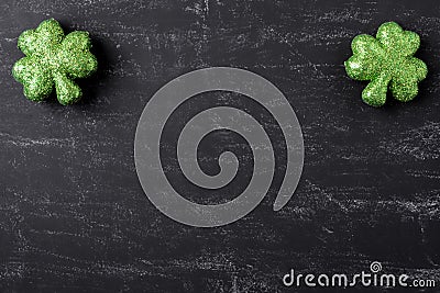 Green Clovers on Chalkboard Background Stock Photo