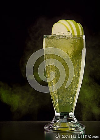 Green cocktail with apples and ice Stock Photo