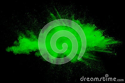 Green color powder explosion cloud on white background. Green dust splash Stock Photo