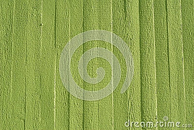 Green concrete wall with wooden structure Stock Photo