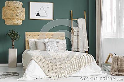 Green cozy bedroom interior Stock Photo