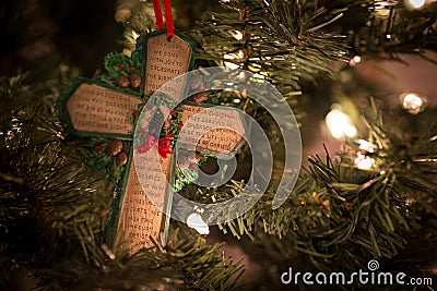 Green cross with Christmas prayer Stock Photo