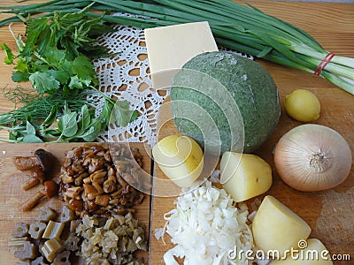 Green dough roll cooked from nettle and wild plants Stock Photo