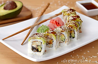 Green dragon sushi roll with eel, avocado Stock Photo