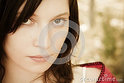 Green eyed woman staring at camera Stock Photo