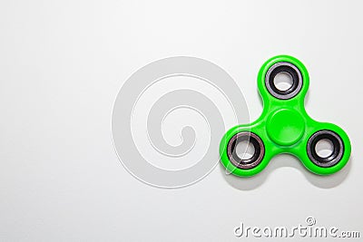 Green Fidget finger spinner toy image Stock Photo