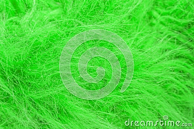 Green fluffy wool texture, animal wool background, painted fur texture closeup Stock Photo