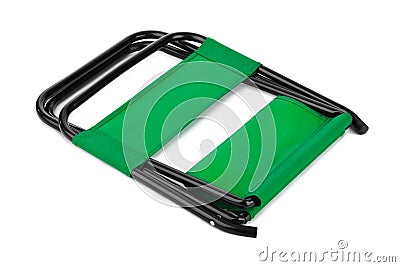 Green folding chair Stock Photo