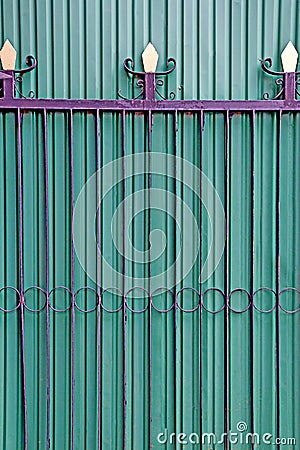 Green folding doors Iron Door Stock Photo