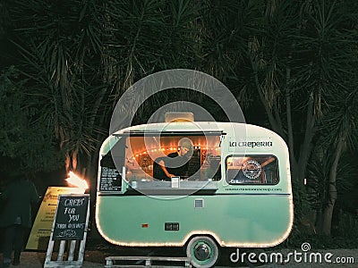 Green Food Truck Editorial Stock Photo