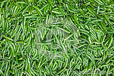 Green fresh chillies background Stock Photo