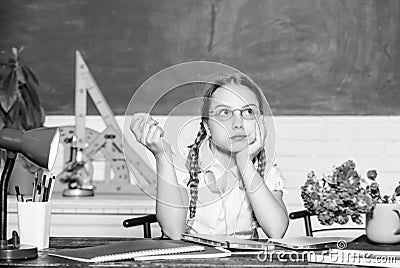 Green fresh ingredients. back to school. Einstein. healthy eating is good. small girl ready to eat apple. Smart child Stock Photo