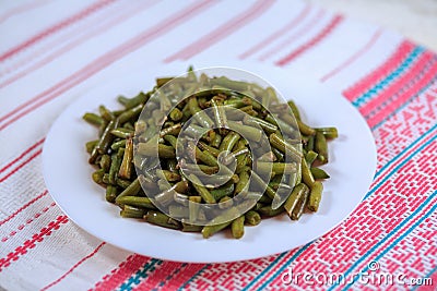 Green fried beans with garlic Stock Photo