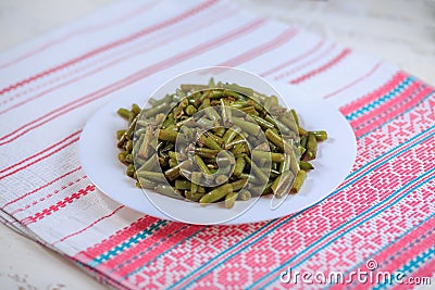 Green fried beans with garlic Stock Photo