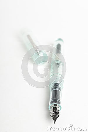 Green Glass Demonstrator Fountain Pen Stock Photo