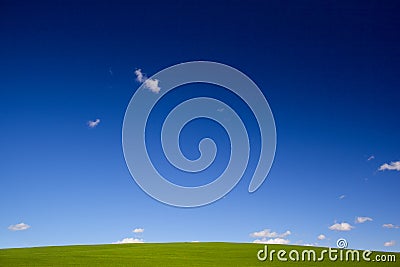 Green grass blue sky Stock Photo