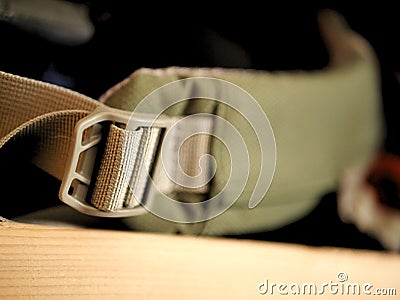Green and grey back pack strap for camping, hiking, and backpacking. Stock Photo